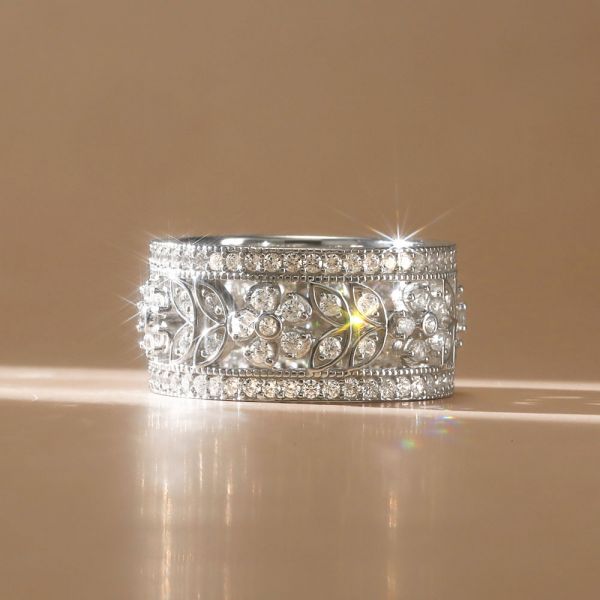 Faith | White Sapphire Floral Eternity Band In Sterling Silver