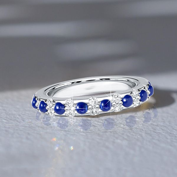 Keily | Round Cut White & Blue Sapphire Cabochon Eternity Band Ring
